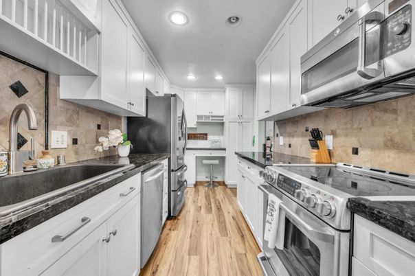 Interior, Kitchen, Recessed Lighting, Stainless Steel Appliances, Wood Texture Flooring