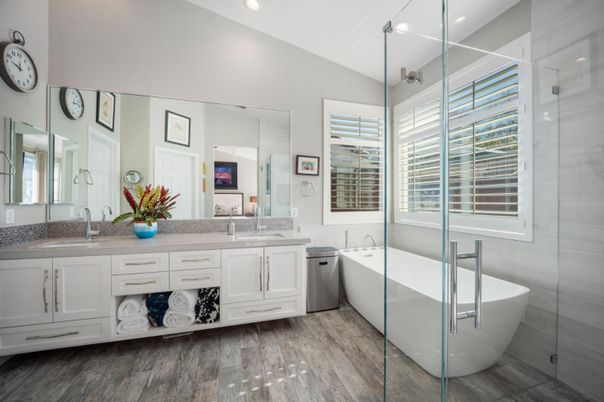 Bathroom, Dual Sink Vanities, Free Standing Baths, Glass Shower, Interior, Recessed Lighting, Wood Texture Flooring