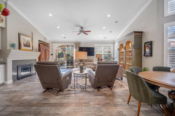 Dining room, Fireplace, Interior, Living room, Recessed Lighting, Wood Texture Flooring
