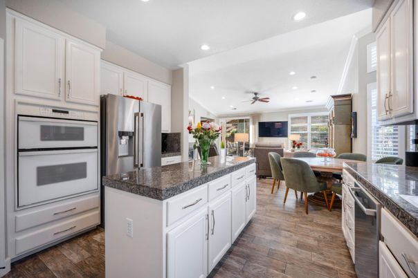 Dining room, Interior, Kitchen, Living room, Recessed Lighting, Stainless Steel Appliances, Wood Texture Flooring