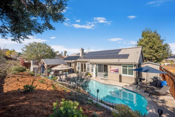 Exterior, Pool, Solar Panels