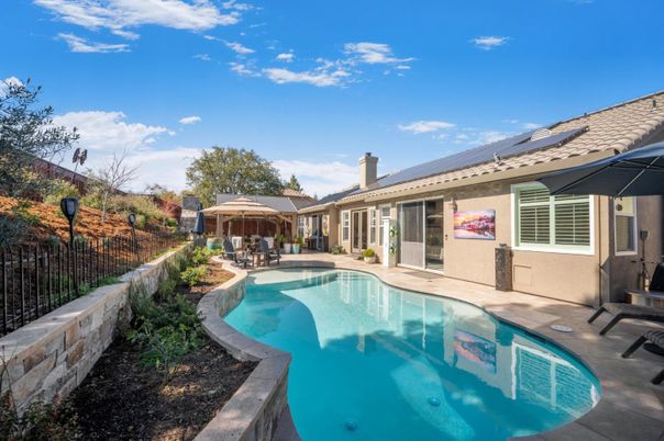 Exterior, Pool, Solar Panels
