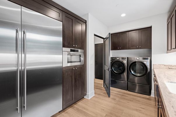 Interior, Kitchen, Recessed Lighting, Stainless Steel Appliances, Washer, Wood Texture Flooring
