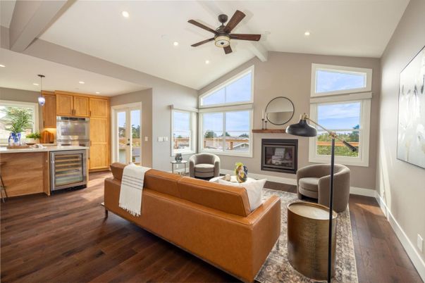 Fireplace, Interior, Kitchen, Living room, Pendant Lights, Recessed Lighting, Stainless Steel Appliances, Wood Texture Flooring