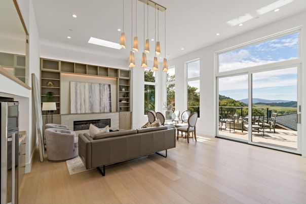 Dining room, Fireplace, Interior, Living room, Pendant Lights, Recessed Lighting, Wood Texture Flooring
