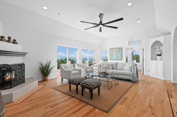 Fireplace, Interior, Living room, Recessed Lighting, Water, Wood Texture Flooring