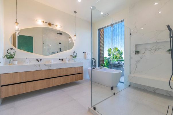Bathroom, Dual Sink Vanities, Free Standing Baths, Glass Shower, Interior, Marble Walls, Pendant Lights, Recessed Lighting