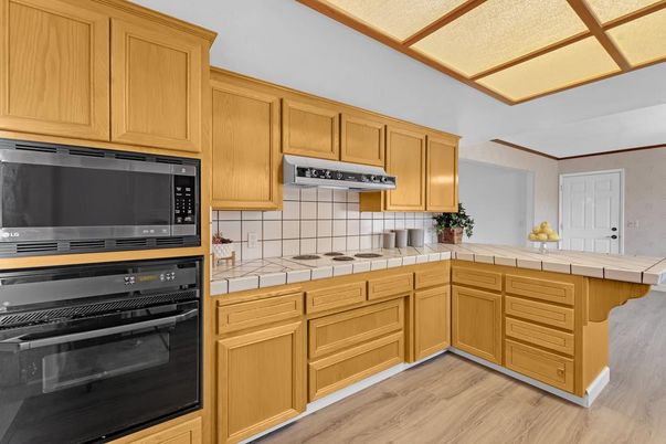 Interior, Kitchen, Tile Countertops, Wood Texture Flooring