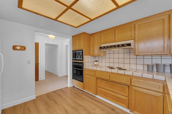 Interior, Kitchen, Tile Countertops, Wood Texture Flooring
