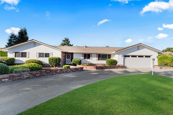 Attached, Backyard, Exterior, Facade, Brick Facade, Ranch