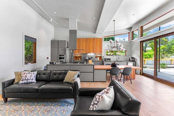 Chandelier, Dining room, Interior, Kitchen, Living room, Pendant Lights, Recessed Lighting, Stainless Steel Appliances, Wood Texture Flooring