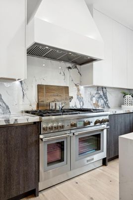 Interior, Kitchen, Marble Walls, Stainless Steel Appliances, Wood Texture Flooring