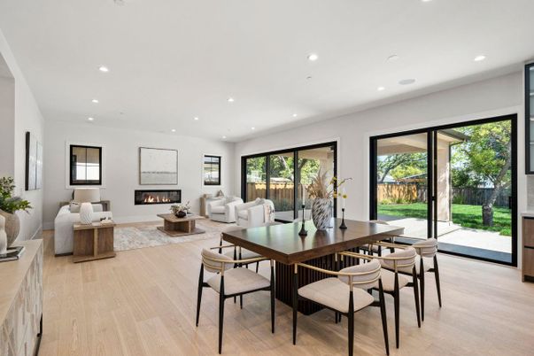 Dining room, Fireplace, Interior, Living room, Recessed Lighting, Wood Texture Flooring