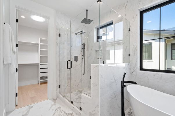 Bathroom, Free Standing Baths, Glass Shower, Interior, Marble, Marble Walls, Recessed Lighting, Wood Texture Flooring