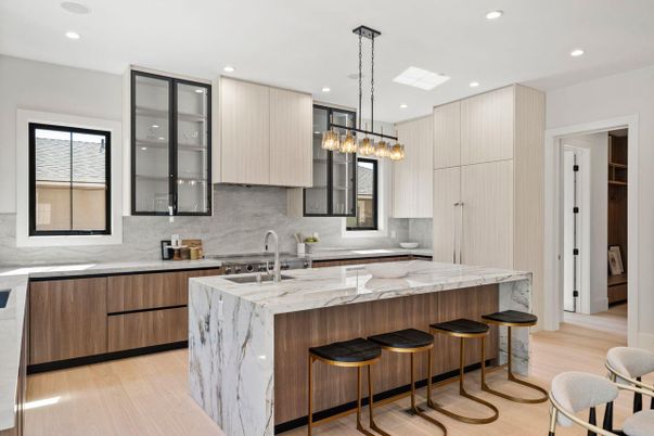 Chandelier, Interior, Kitchen, Marble Walls, Pendant Lights, Recessed Lighting, Stainless Steel Appliances, Wood Texture Flooring