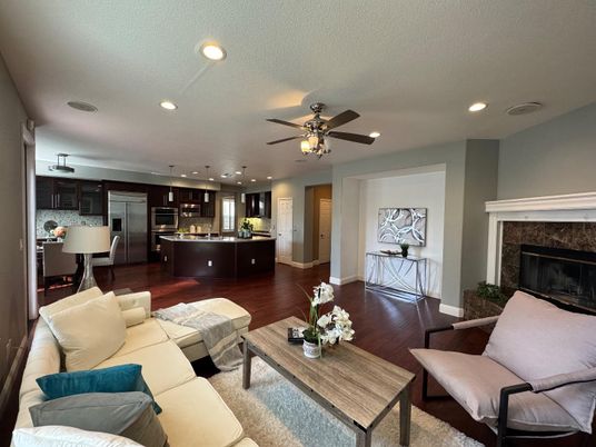 Fireplace, Interior, Kitchen, Living room, Recessed Lighting, Stainless Steel Appliances, Wood Texture Flooring