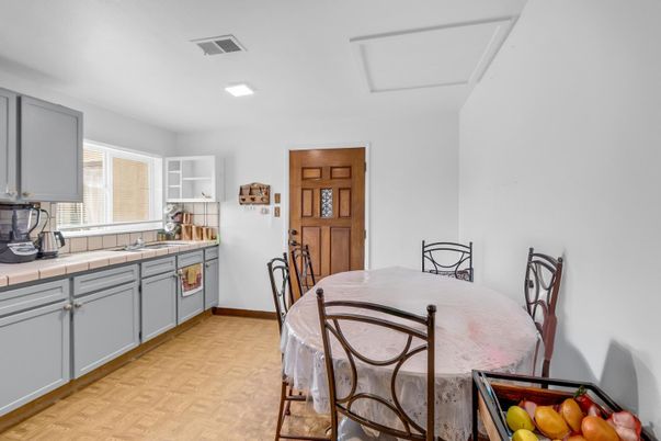 Dining room, Interior, Kitchen, Recessed Lighting, Tile Countertops, Wood Texture Flooring