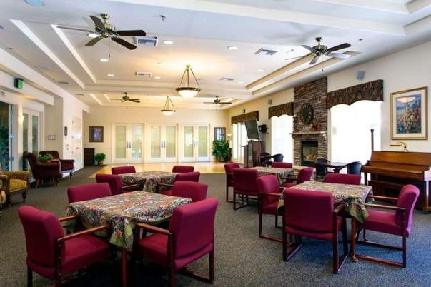 Dining room, Fireplace, Interior, Living room, Piano, Recessed Lighting, Stone Walls