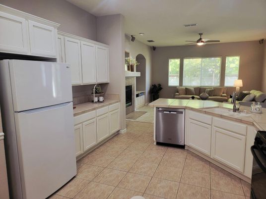 Fireplace, Interior, Kitchen, Recessed Lighting, Tile Countertops