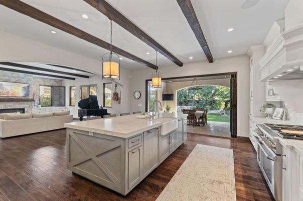 Dining room, Fireplace, Interior, Kitchen, Living room, Pendant Lights, Recessed Lighting, Stainless Steel Appliances, Stone Walls, Wooden Beams, Wood Texture Flooring