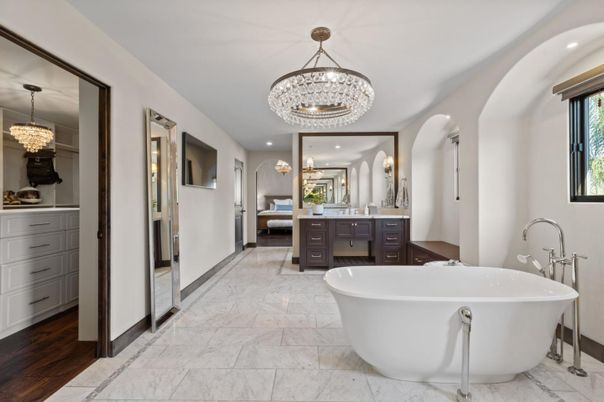 Bathroom, Chandelier, Dual Sink Vanities, Free Standing Baths, Interior, Marble, Recessed Lighting, Wood Texture Flooring