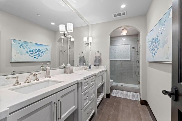 Bathroom, Dual Sink Vanities, Glass Shower, Interior, Recessed Lighting, Wood Texture Flooring