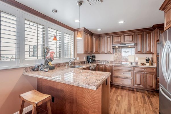Interior, Kitchen, Pendant Lights, Recessed Lighting, Stainless Steel Appliances, Wood Texture Flooring