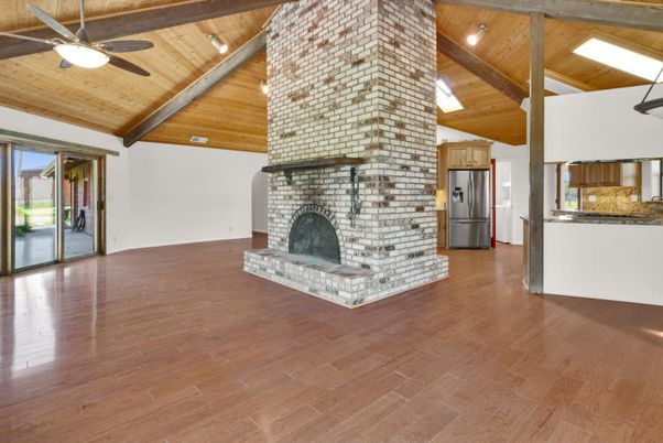 Empty room, Fireplace, Interior, Kitchen, Stone Walls, Wooden Beams, Wooden Ceilings, Wood Texture Flooring