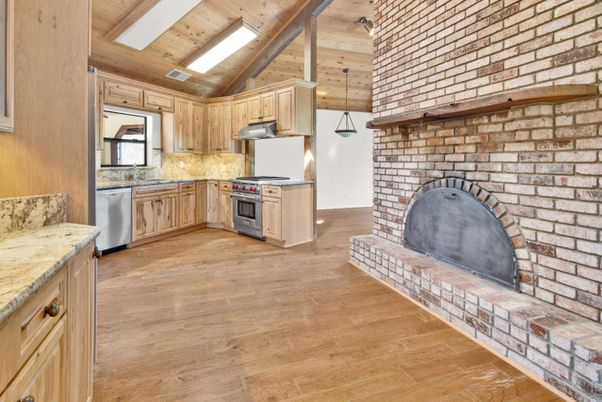 Interior, Kitchen, Pendant Lights, Stainless Steel Appliances, Stone Walls, Wooden Ceilings, Wood Texture Flooring