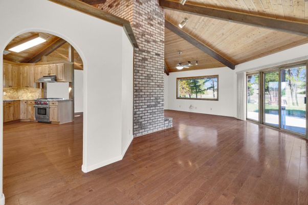 Empty room, Interior, Kitchen, Stainless Steel Appliances, Stone Walls, Wooden Beams, Wooden Ceilings, Wood Texture Flooring