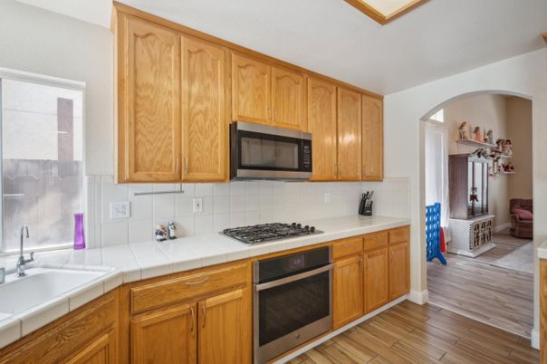 Interior, Kitchen, Tile Countertops, Wood Texture Flooring