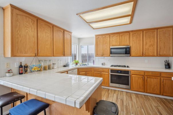 Interior, Kitchen, Tile Countertops, Wood Texture Flooring
