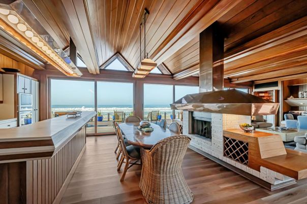 Dining room, Fireplace, Interior, Living room, Pendant Lights, Water, Wooden Beams, Wooden Ceilings, Wood Texture Flooring