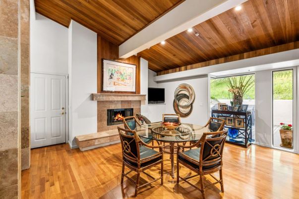Dining room, Fireplace, Interior, Recessed Lighting, Stone Walls, Wooden Ceilings, Wood Texture Flooring