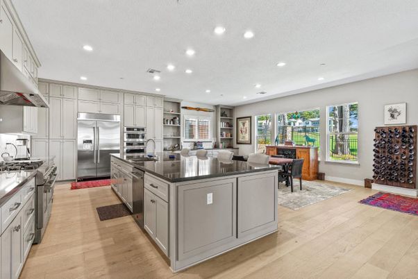 Dining room, Interior, Kitchen, Recessed Lighting, Stainless Steel Appliances, Wood Texture Flooring