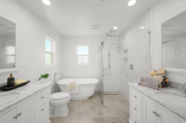 Bathroom, Dual Sink Vanities, Free Standing Baths, Glass Shower, Interior, Marble Walls, Recessed Lighting