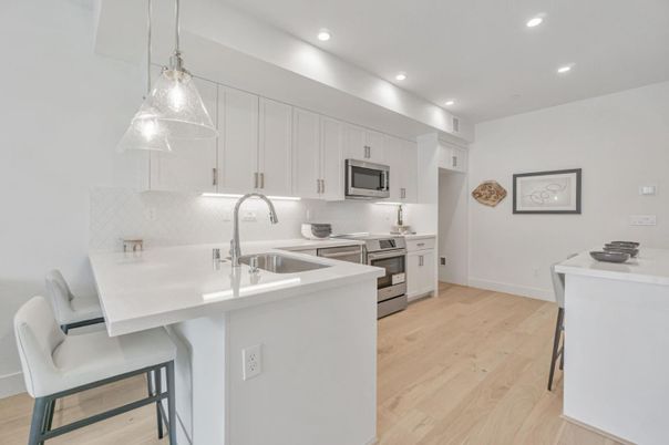 Interior, Kitchen, Pendant Lights, Recessed Lighting, Stainless Steel Appliances, Wood Texture Flooring