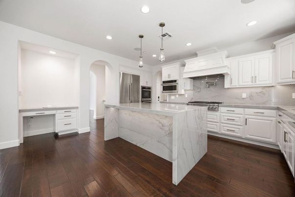Interior, Kitchen, Marble Walls, Pendant Lights, Recessed Lighting, Stainless Steel Appliances, Wood Texture Flooring