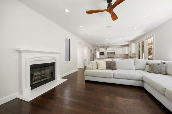 Fireplace, Interior, Kitchen, Living room, Pendant Lights, Recessed Lighting, Stainless Steel Appliances, Wood Texture Flooring