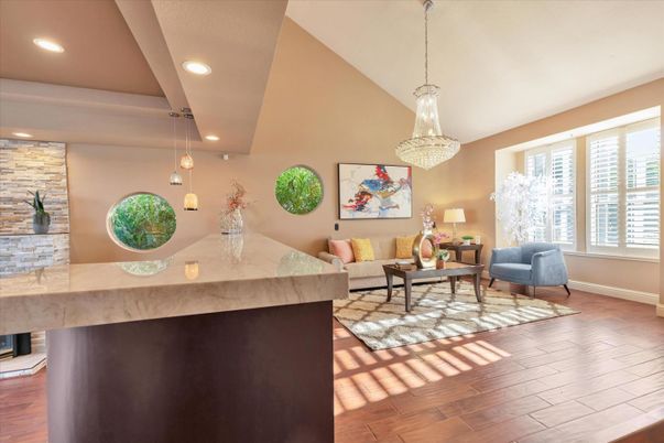 Chandelier, Interior, Living room, Pendant Lights, Recessed Lighting, Stone Walls, Wood Texture Flooring