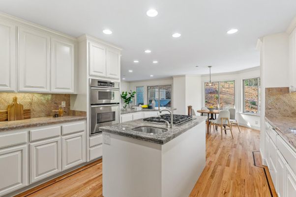 Dining room, Interior, Kitchen, Pendant Lights, Recessed Lighting, Stainless Steel Appliances, Wood Texture Flooring