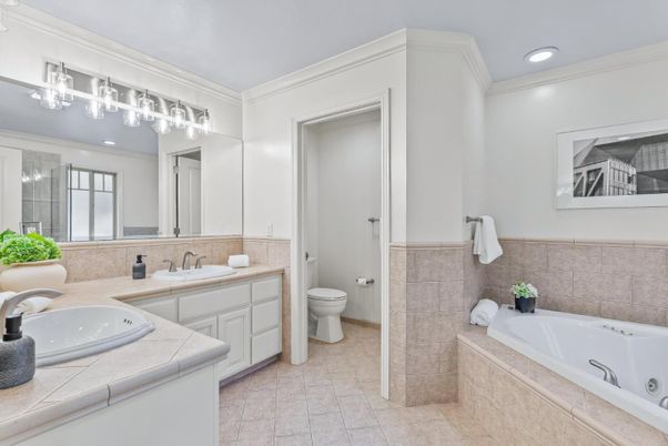 Bathroom, Dual Sink Vanities, Interior, Recessed Lighting, Tile Countertops