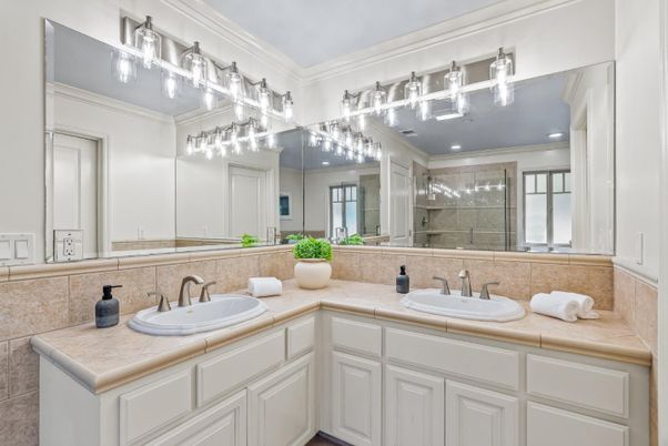 Bathroom, Dual Sink Vanities, Glass Shower, Interior, Recessed Lighting, Tile Countertops