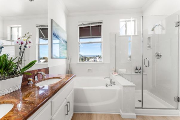 Bathroom, Dual Sink Vanities, Glass Shower, Interior, Wood Texture Flooring