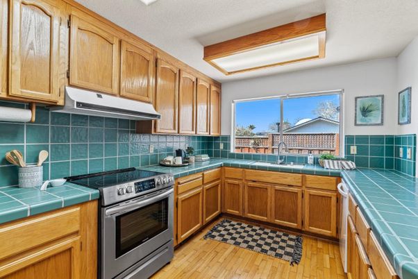 Interior, Kitchen, Tile Countertops, Wood Texture Flooring
