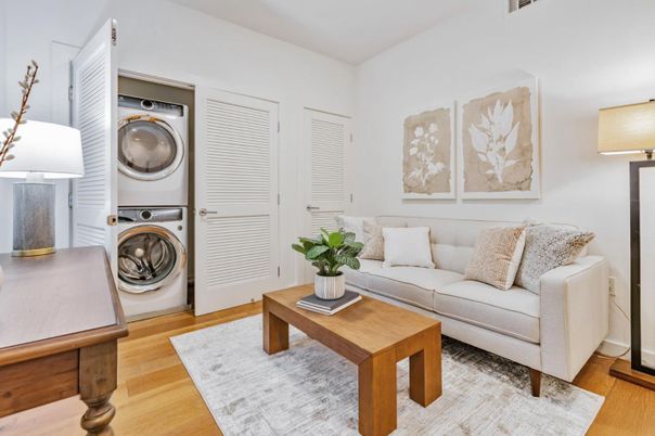 Interior, Living room, Utility Closets, Washer, Wood Texture Flooring
