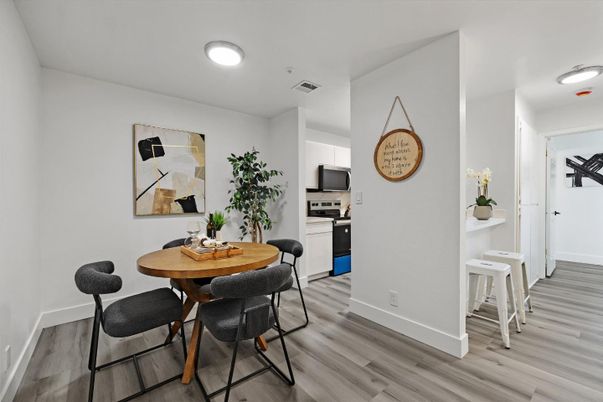 Dining room, Interior, Kitchen, Recessed Lighting, Stainless Steel Appliances, Wood Texture Flooring
