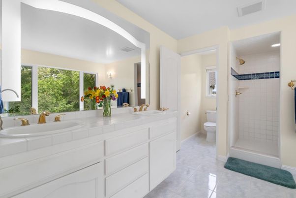 Bathroom, Dual Sink Vanities, Interior, Recessed Lighting, Tile Countertops