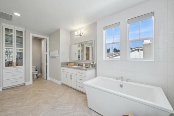 Bathroom, Dual Sink Vanities, Free Standing Baths, Interior, Recessed Lighting, Wood Texture Flooring