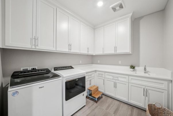 Interior, Kitchen, Recessed Lighting, Washer, Wood Texture Flooring